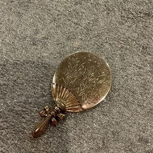 1928 brand gold tone brooch